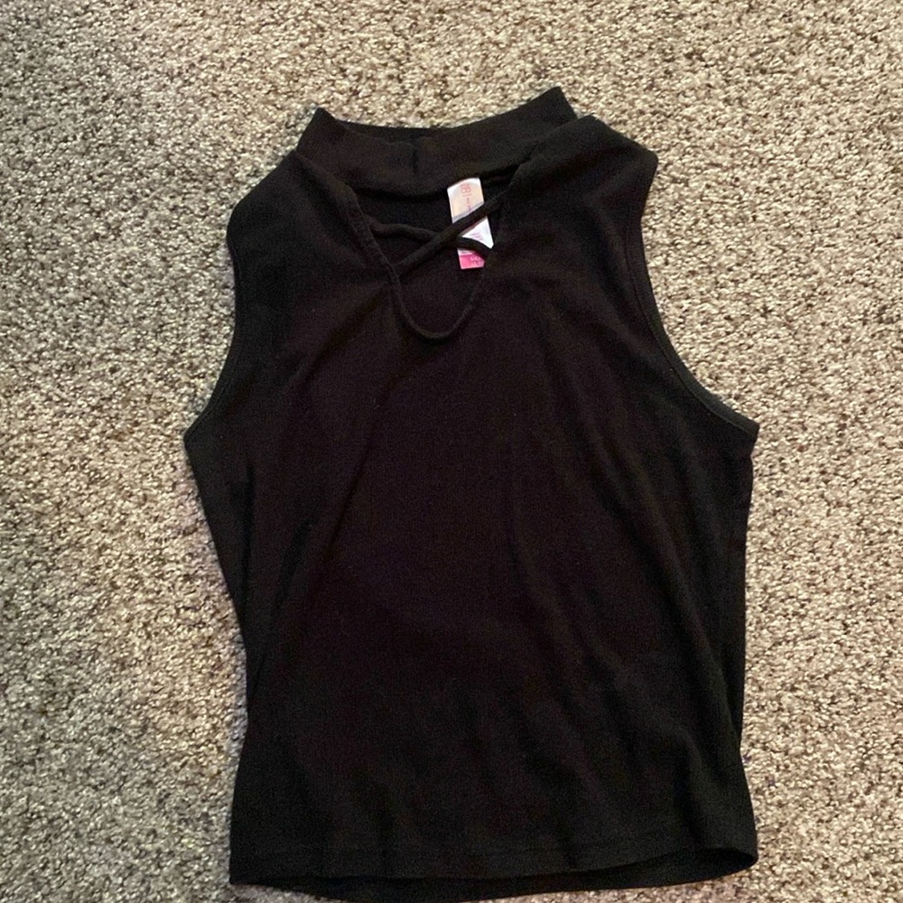 No Boundaries S black tank top 
57% cotton 38% polyester 5% spandex